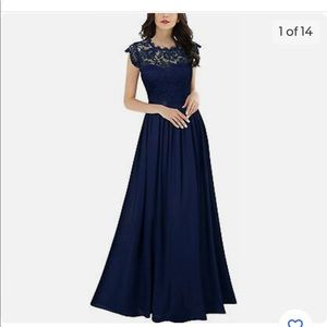 New with tags Navy blue formal dress. Never worn, unaltered dress.